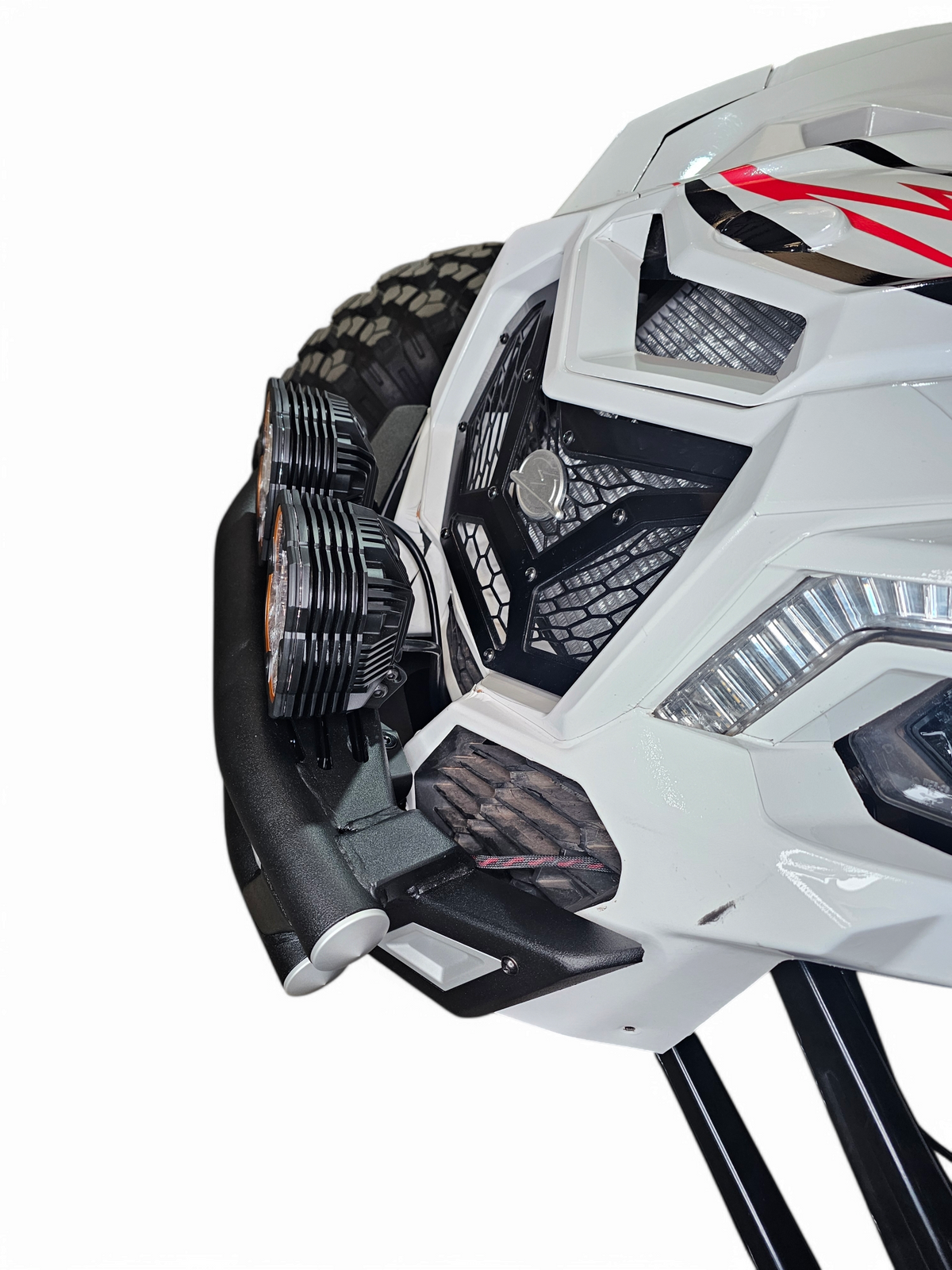 Amp front bumper with light bar mounted on Can-Am Maverick X3 showing lighting configuration