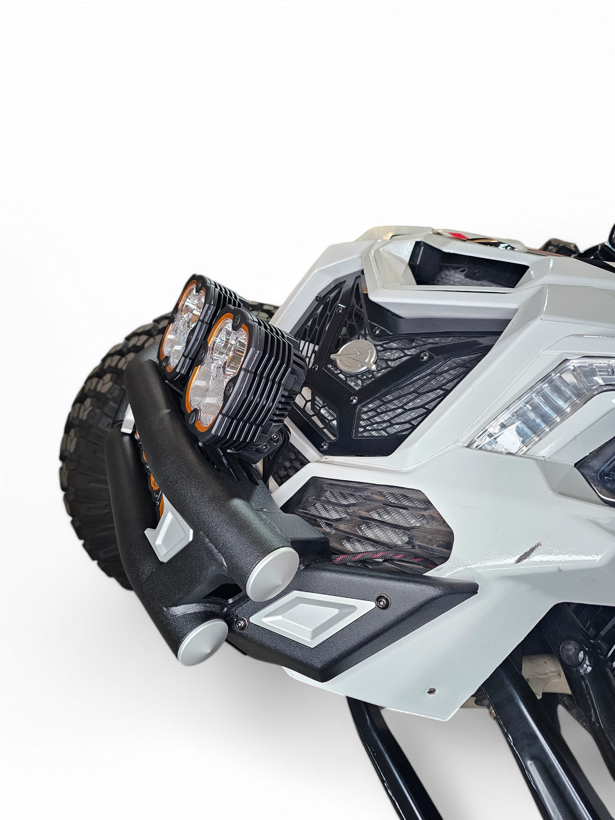 Bolt-on mounting point detail on Can-Am Maverick X3 Amp front bumper showing factory attachment