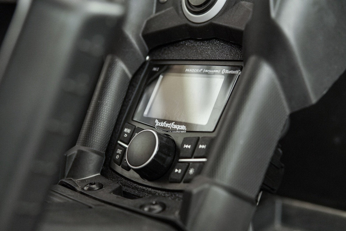 Rockford Fosgate digital media receiver installed in a vehicle dashboard