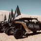 Row of off-road vehicles with 'MARS SNOWPUP' branding on sand dunes.