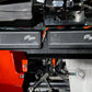 Two UTV Stereo amplifiers mounted in a vehicle engine bay