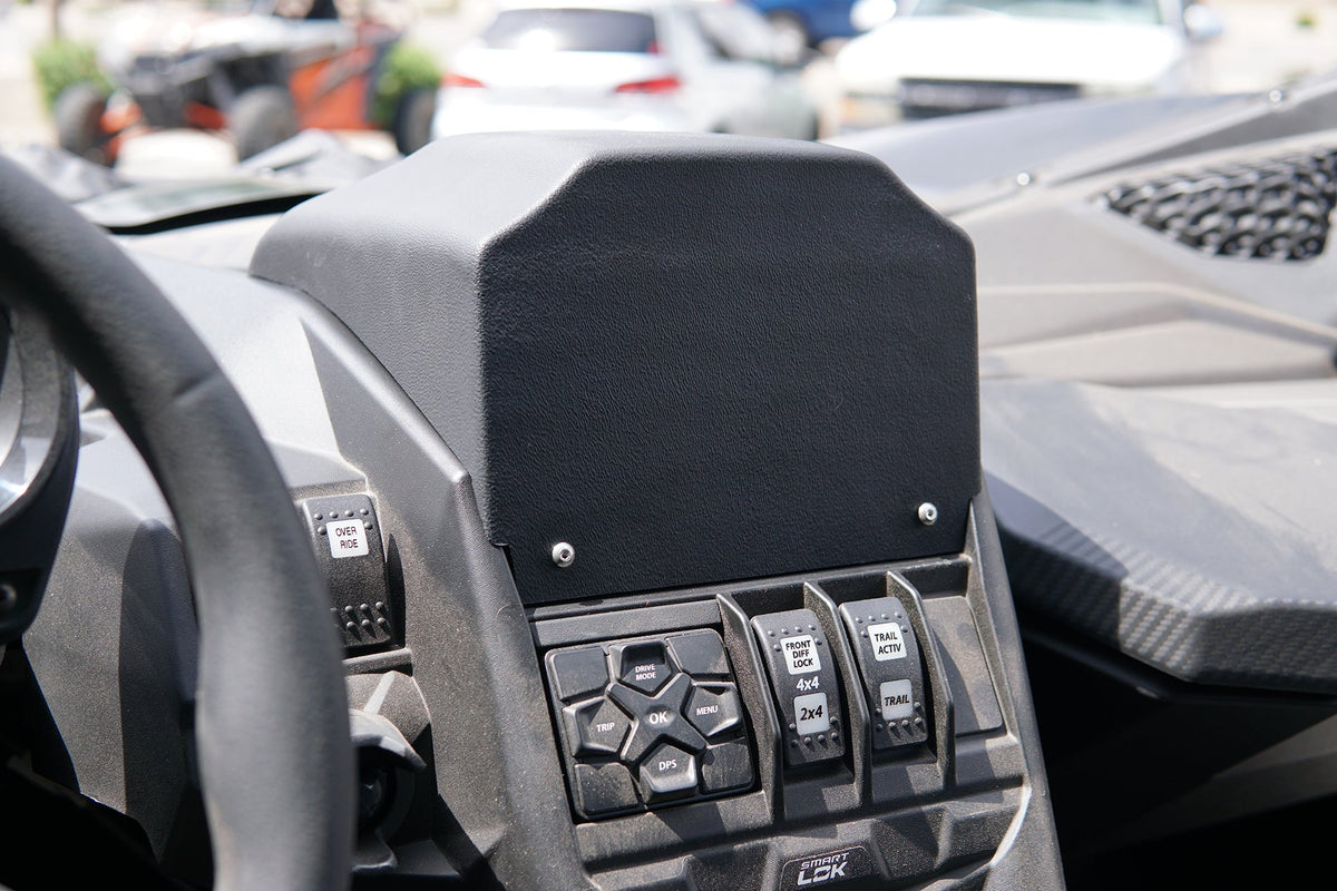 UTV Stereo dash mount installed in a vehicle center console