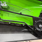 Kawasaki vehicle door interior with black metal frame and mounted speaker