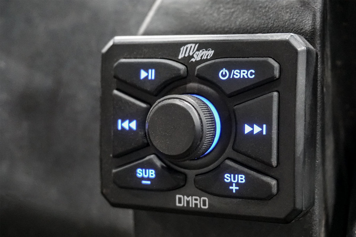 UTV Stereo DMRO media controller with backlit buttons and central volume knob