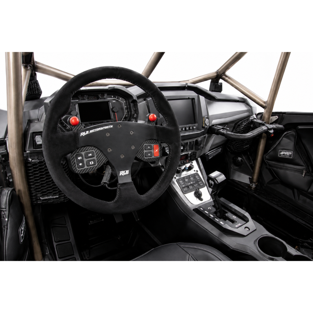 Polaris Pro R UTV dash: stock steering wheel versus RLB suede steering wheel with Adapt IQ button mount installed