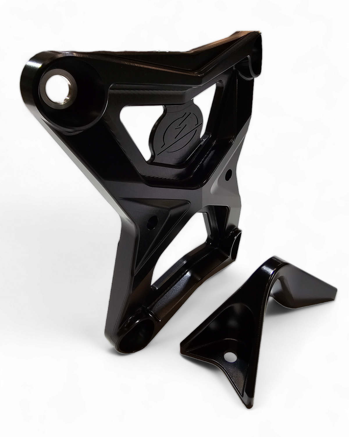 Underside view of Polaris RZR Pro XP radius rod plate showing bolt-on mounting