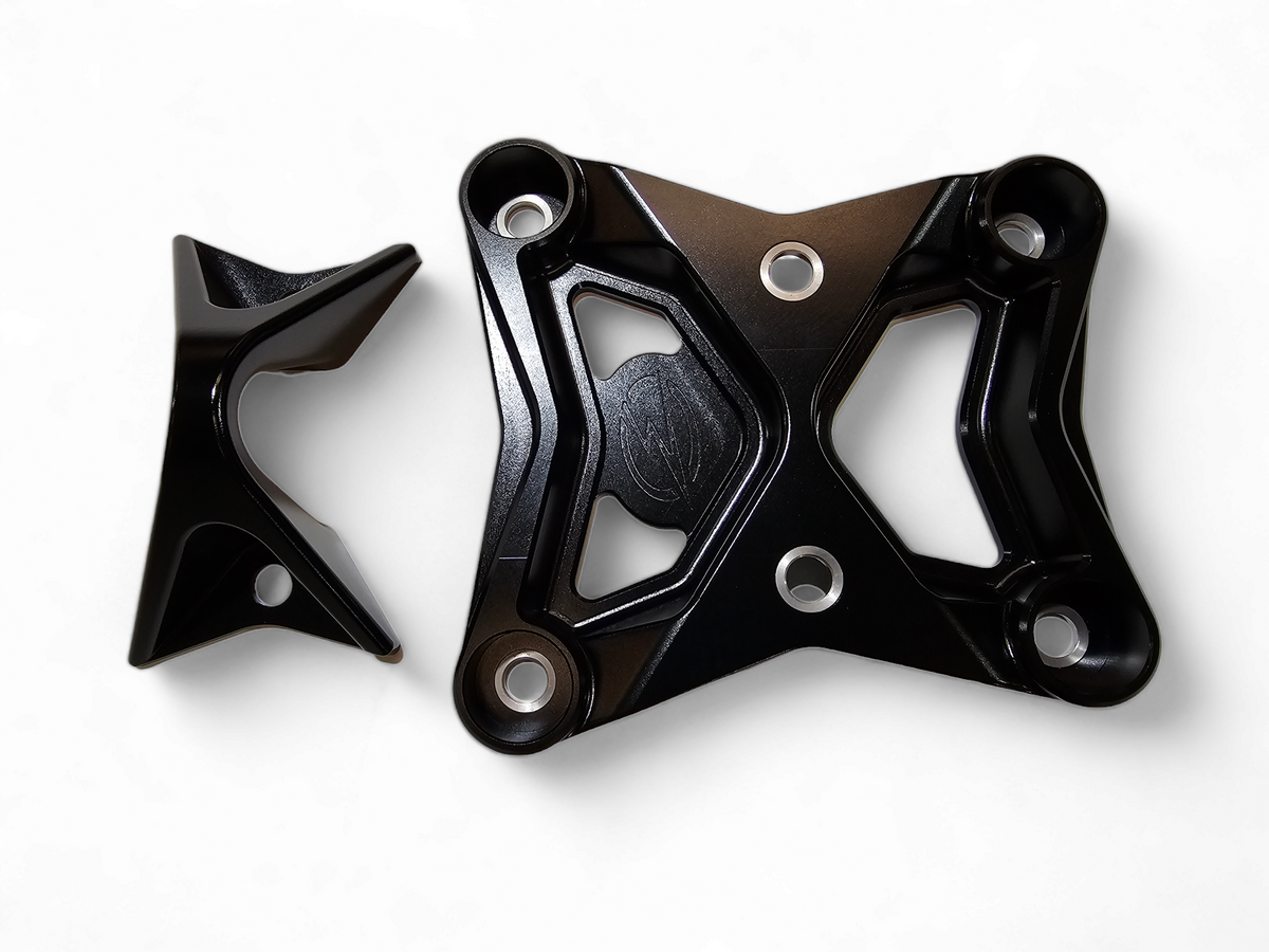 6-bolt mounting pattern detail on Can-Am Maverick X3 black radius rod plate