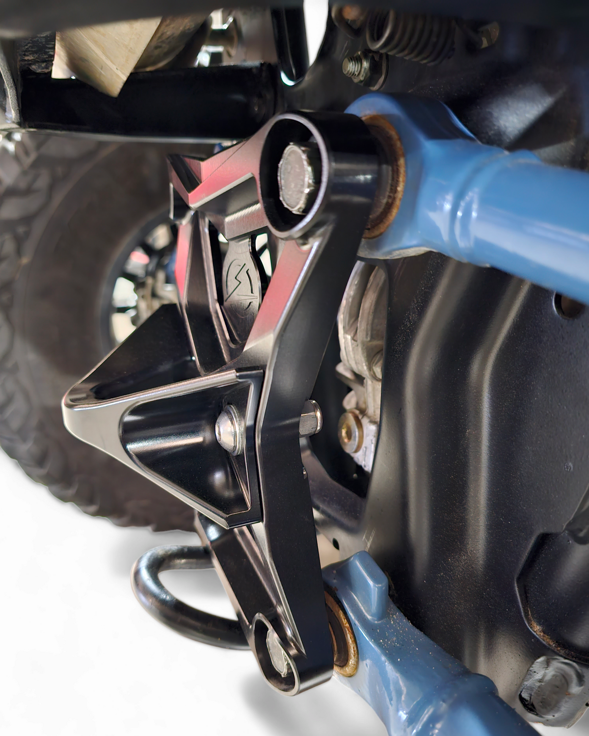 Stainless steel sleeve insert detail on Polaris RZR Pro XP radius rod plate