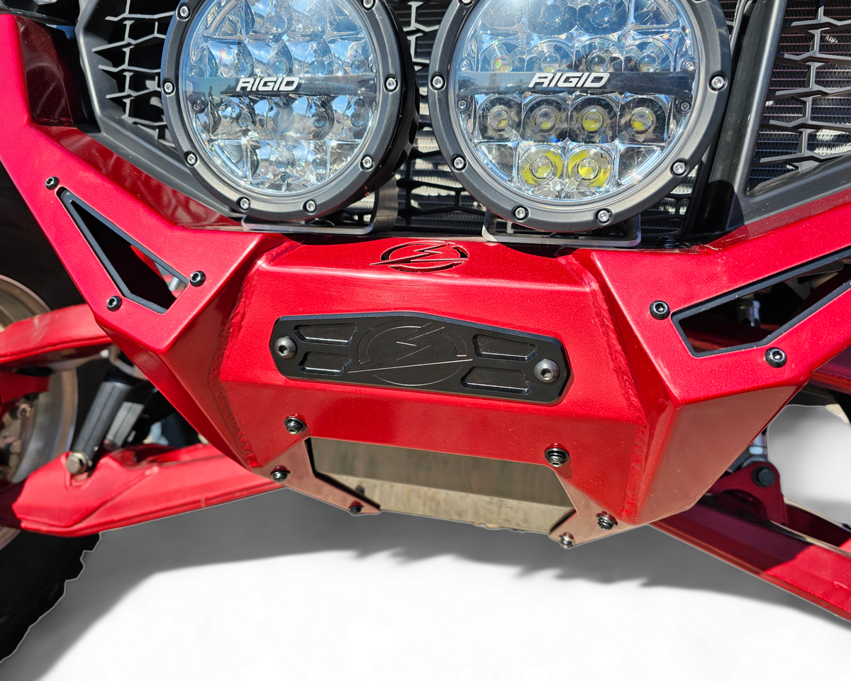 Fairlead Cover Plate installed on a UTV bumper in anodized black billet aluminum