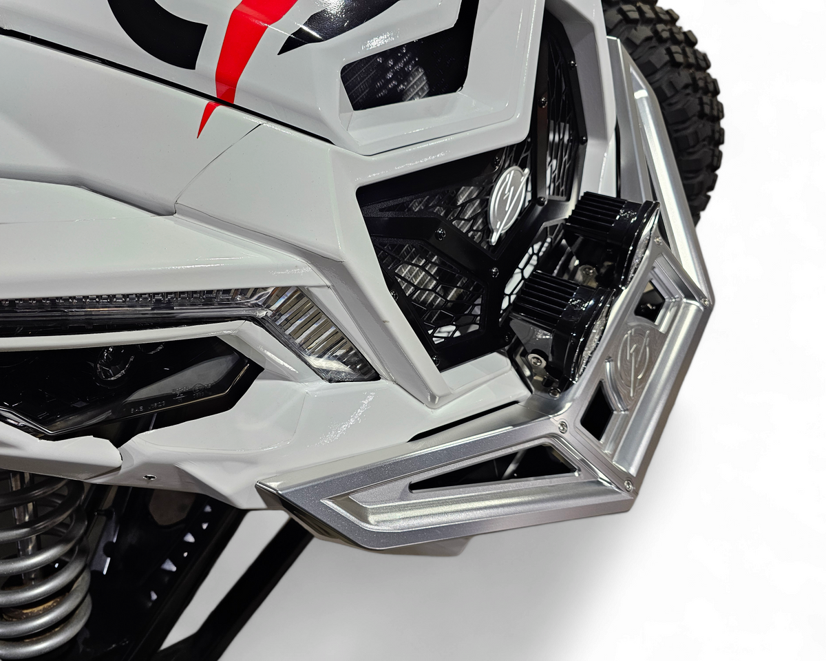 Corner machining detail of Can-Am Maverick X3 clear anodized billet front winch bumper showing CNC quality