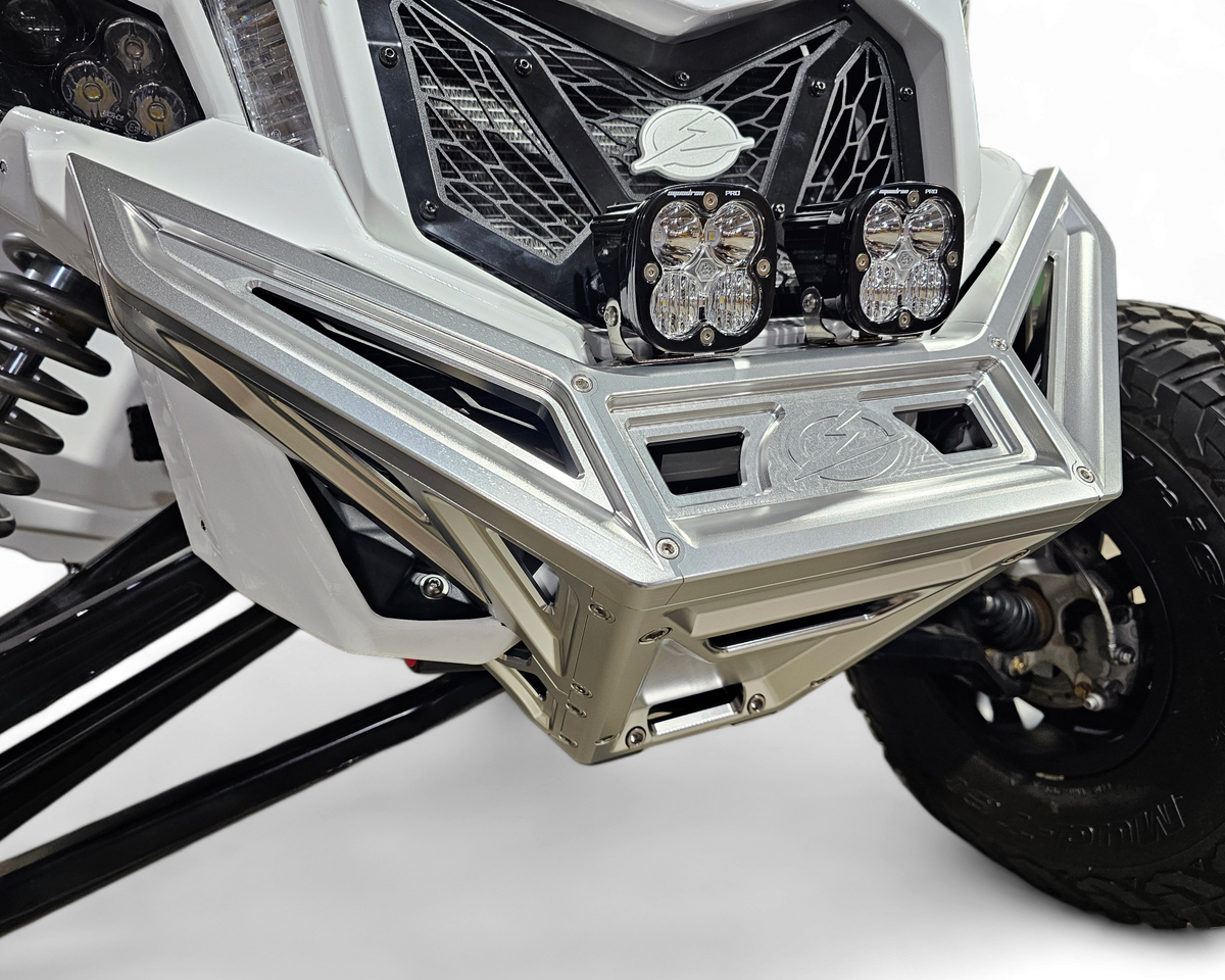 Installed profile of clear anodized billet front winch bumper on Can-Am Maverick X3 demonstrating body-line fitment