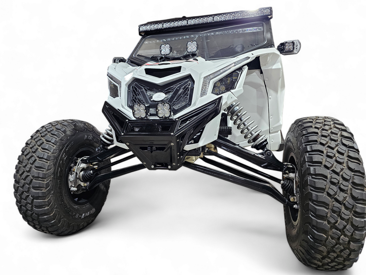 Corner machining detail of black anodized Can-Am Maverick X3 billet front winch bumper showing CNC quality