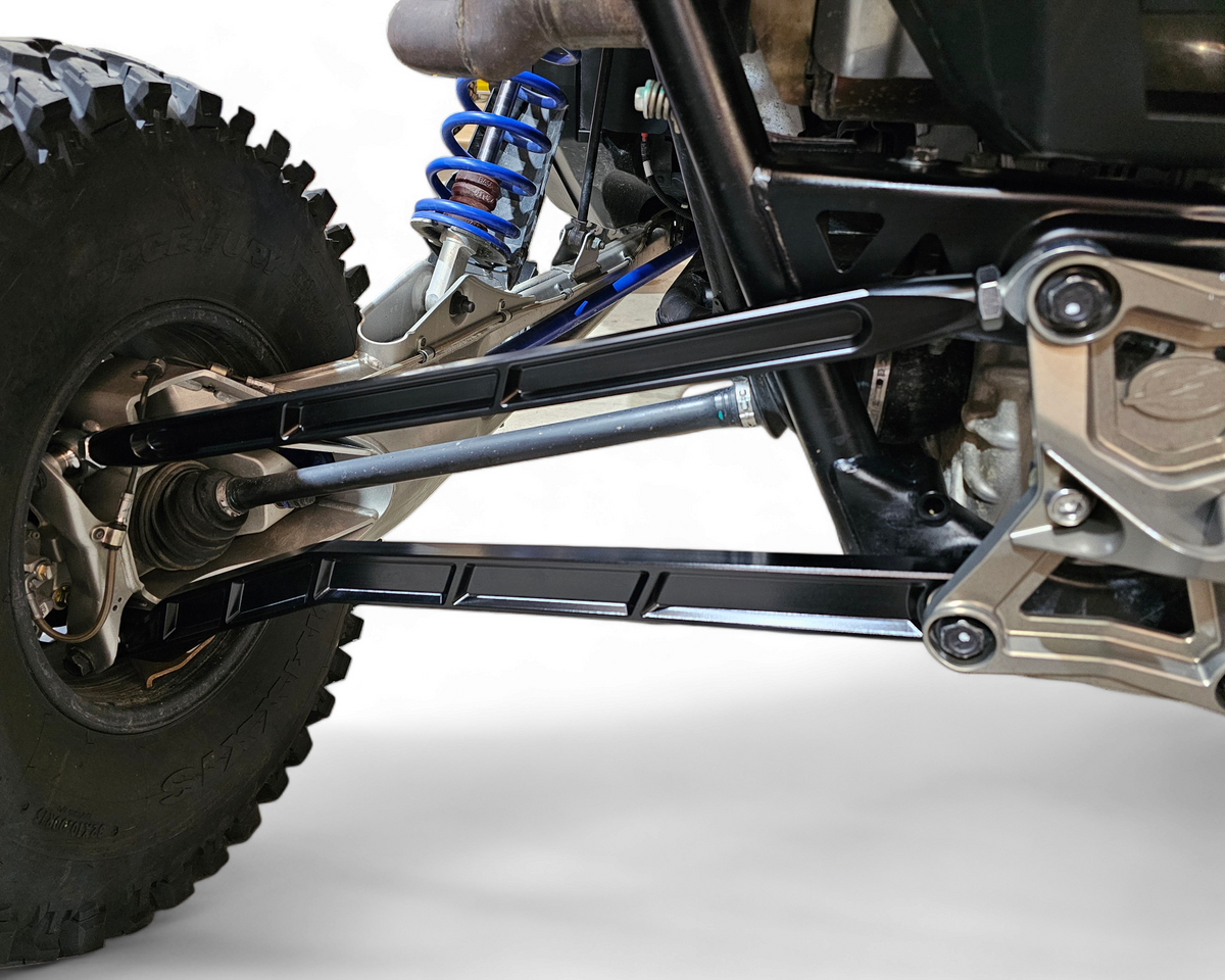 Radius rod bolting into factory position on Polaris RZR Pro R