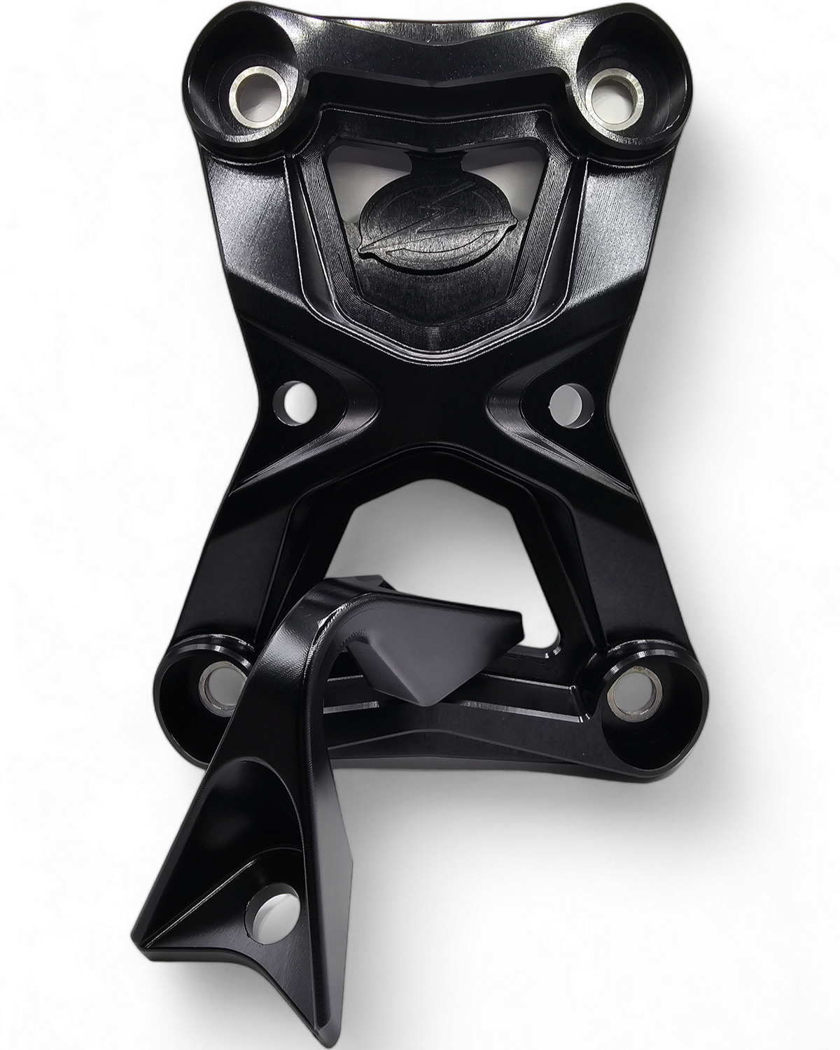 Integrated tow hook detail on Polaris RZR black radius rod plate