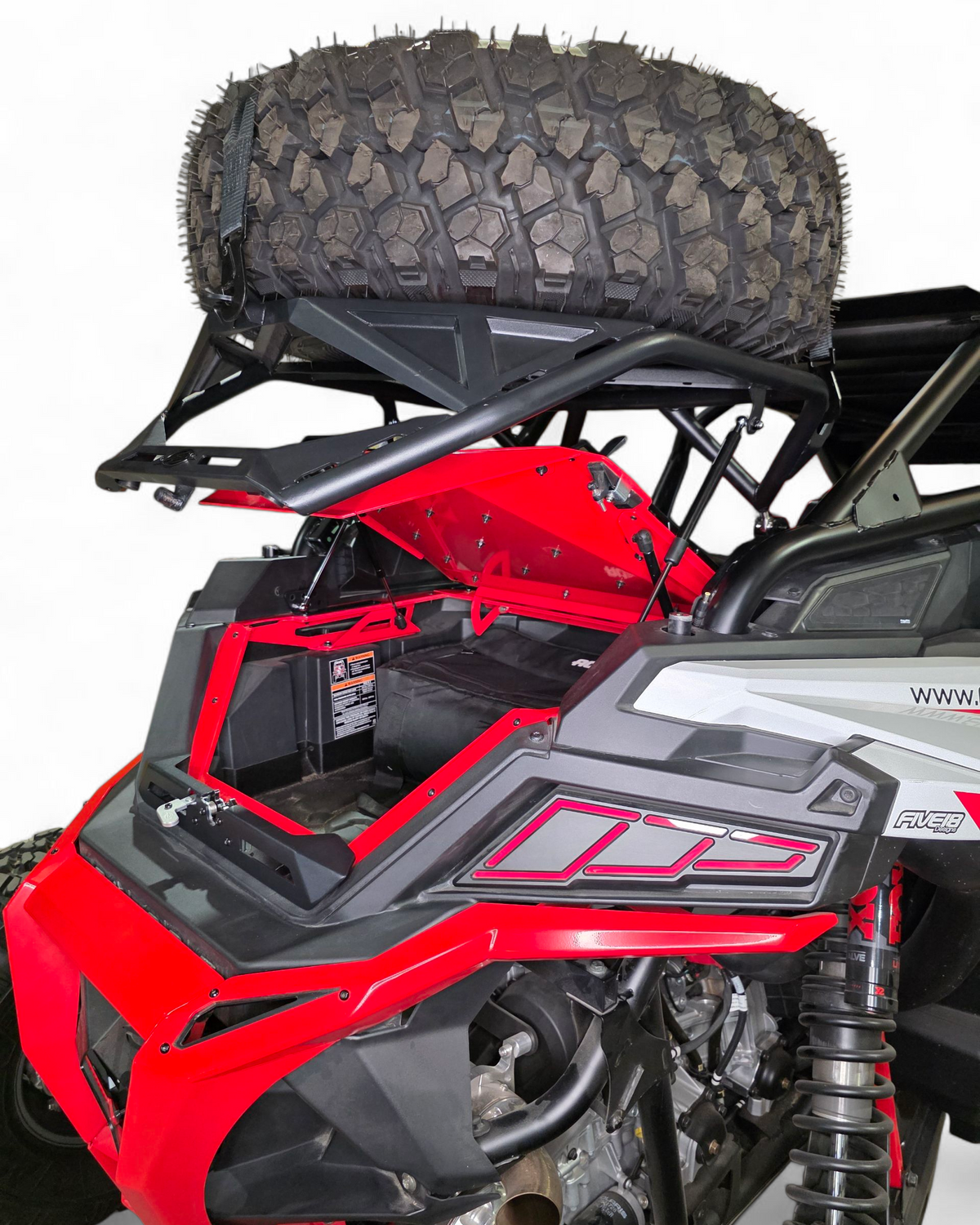 High-clearance design detail on Polaris RZR tire rack showing undercarriage storage room