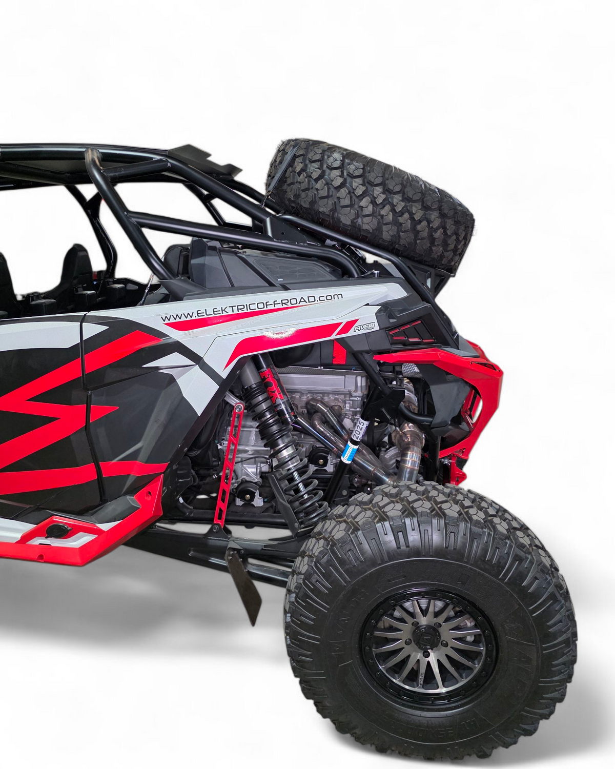 Driver side view of high clearance tire rack installed on Polaris RZR