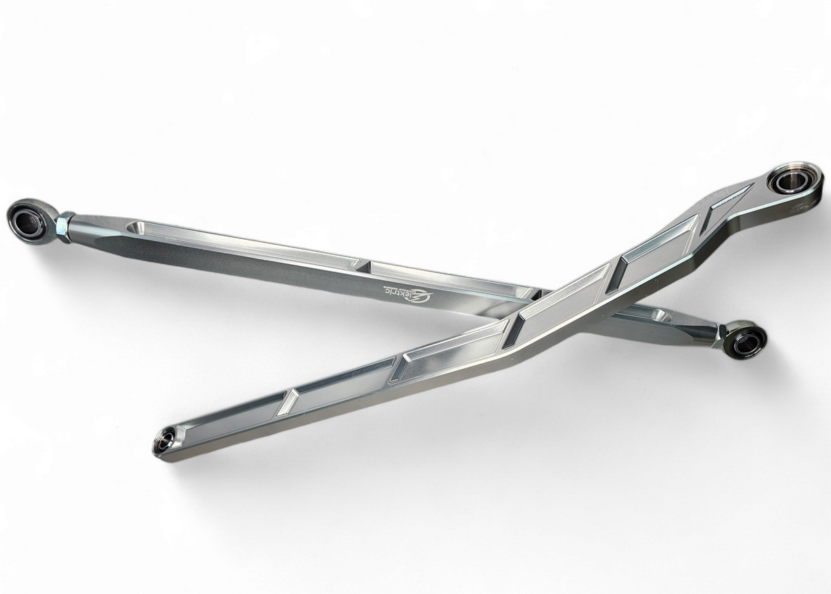 High Clearance Radius Rods in clear hard anodize for Polaris RZR Pro R showing raw machined 6061 billet aluminum