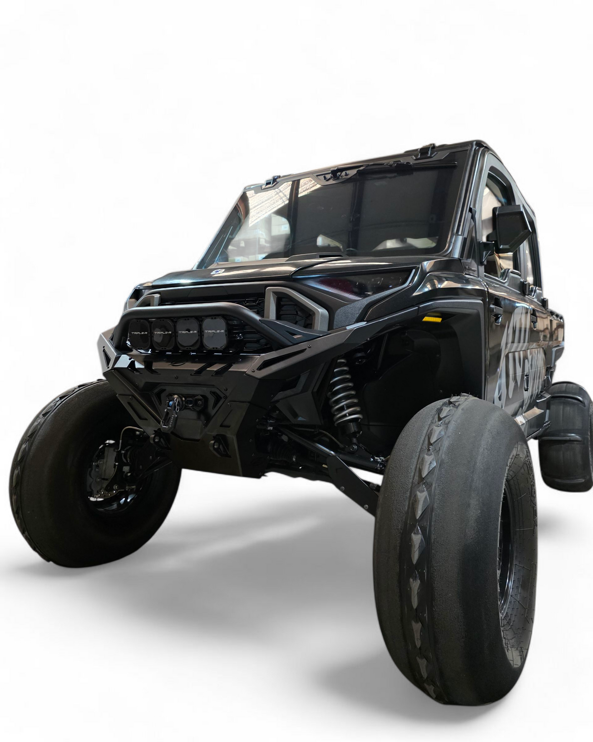 XD Volt Front Winch Bumper installed on 2024 Polaris Ranger 1500 showing D-ring and hammer black finish