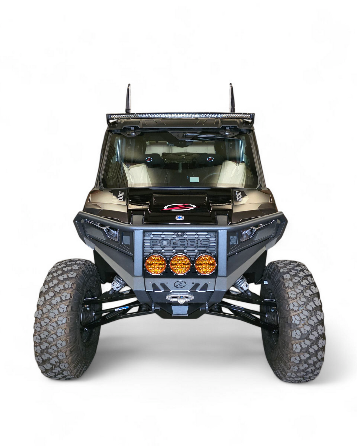 Front three-quarter view of Polaris Xpedition HDX Bumper with brush guard showing upper hood and grille protection