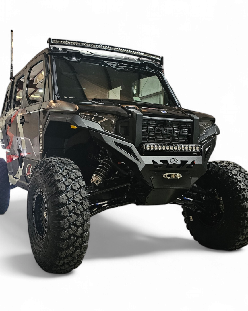 Front three-quarter view of Polaris Xpedition Volt Series Winch Front Bumper showing slim tight fitment and satin black panels