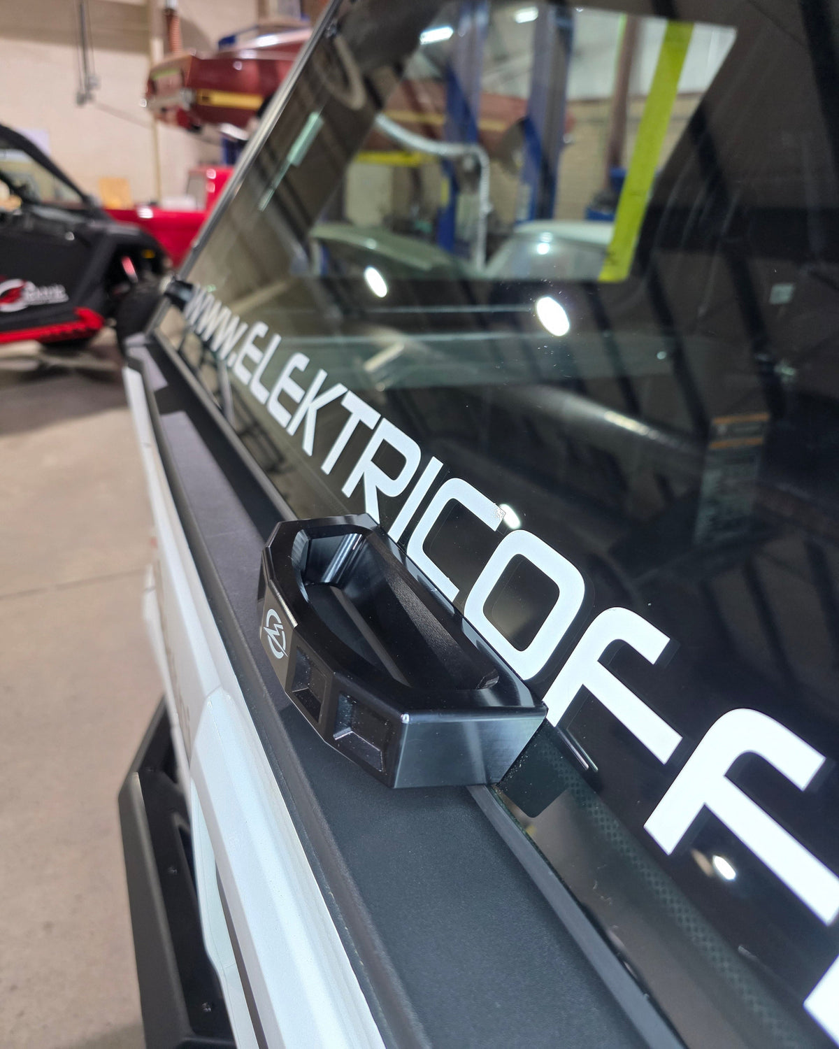 Polaris Xpedition rear glass grab handle shown installed on the rear glass