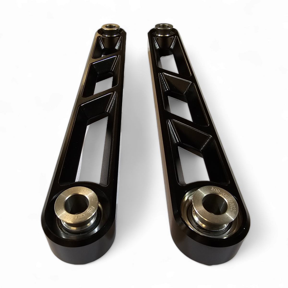 Teflon-coated uni-ball and misalignment spacer detail on Polaris RZR black sway bar link