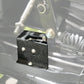 Black metal bracket installed on vehicle chassis with mechanical linkage