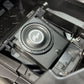 UTV Stereo subwoofer installed in a vehicle storage compartment