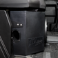UTV Stereo black subwoofer enclosure installed under a vehicle seat