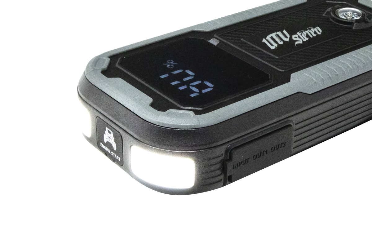 UTV Stereo portable jump starter with digital display and integrated LED flashlight