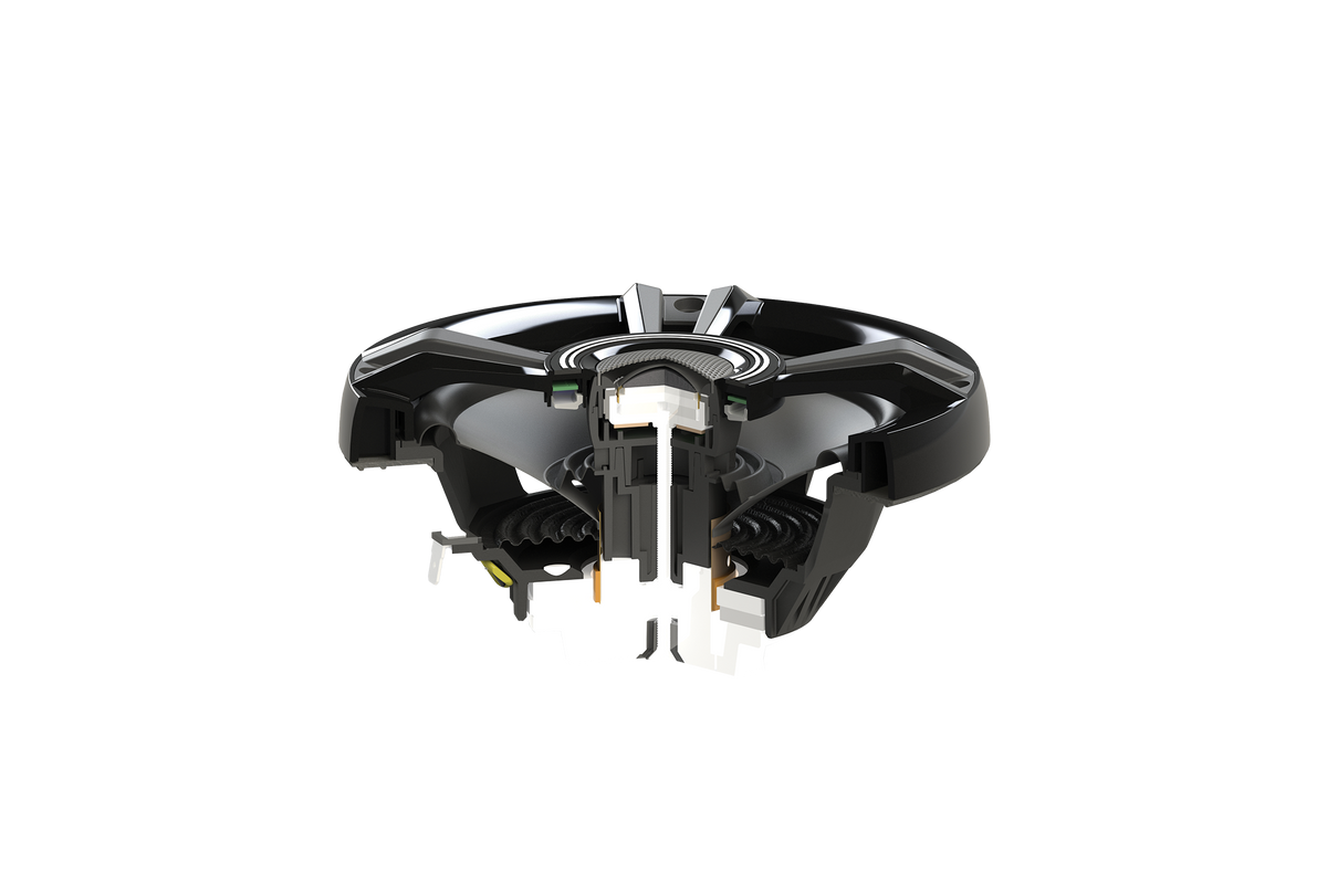 Cross section view of a black car audio speaker showing internal components