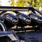 Three black UTV Stereo speakers mounted on a vehicle roll cage