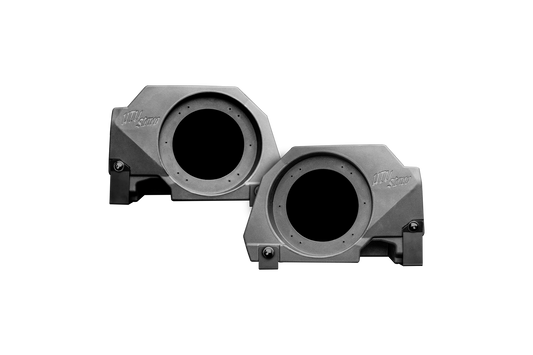 Two UTV Stereo black speaker enclosures with circular cutouts