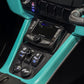 Wet Sounds media center and accessory switches on a teal vehicle dashboard