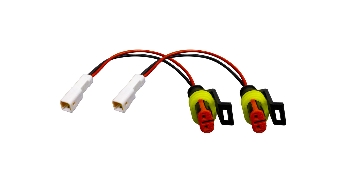 UTV Stereo wiring harness adapter with two white connectors and two sealed red and black connectors