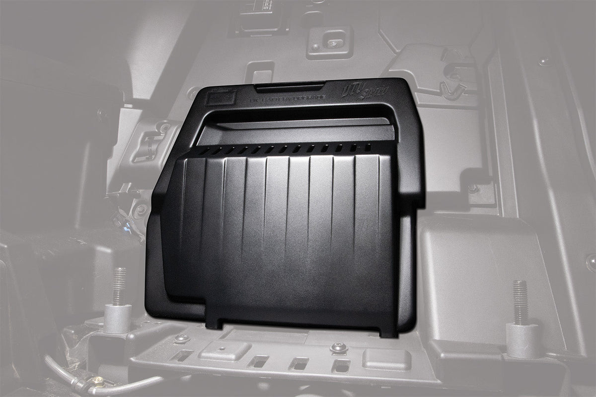 UTV Stereo black plastic battery cover installed in vehicle