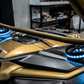 UTV Stereo speakers with blue LED rings installed in a gold off-road vehicle dashboard