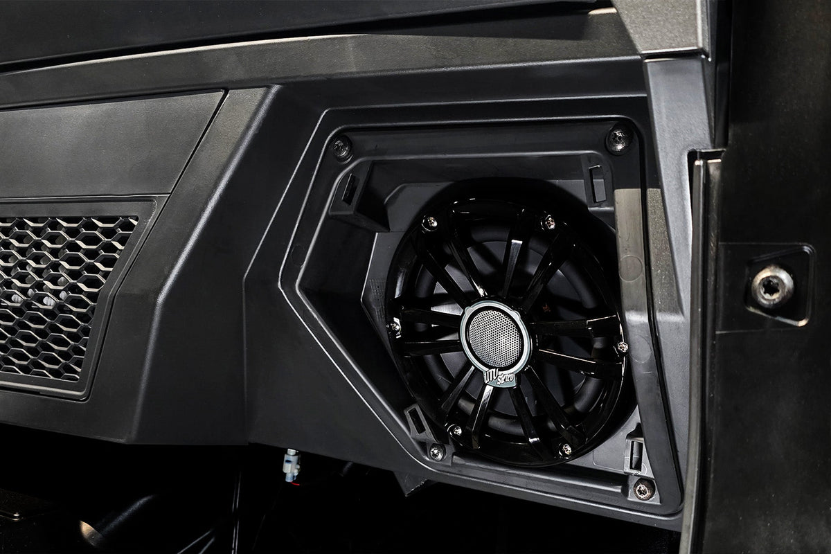 UTV Stereo speaker installed in a vehicle dashboard panel