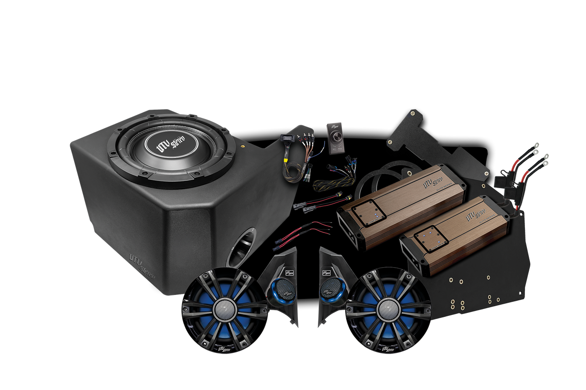 UTV Stereo audio system kit including subwoofer enclosure, two amplifiers, speakers, and wiring harness