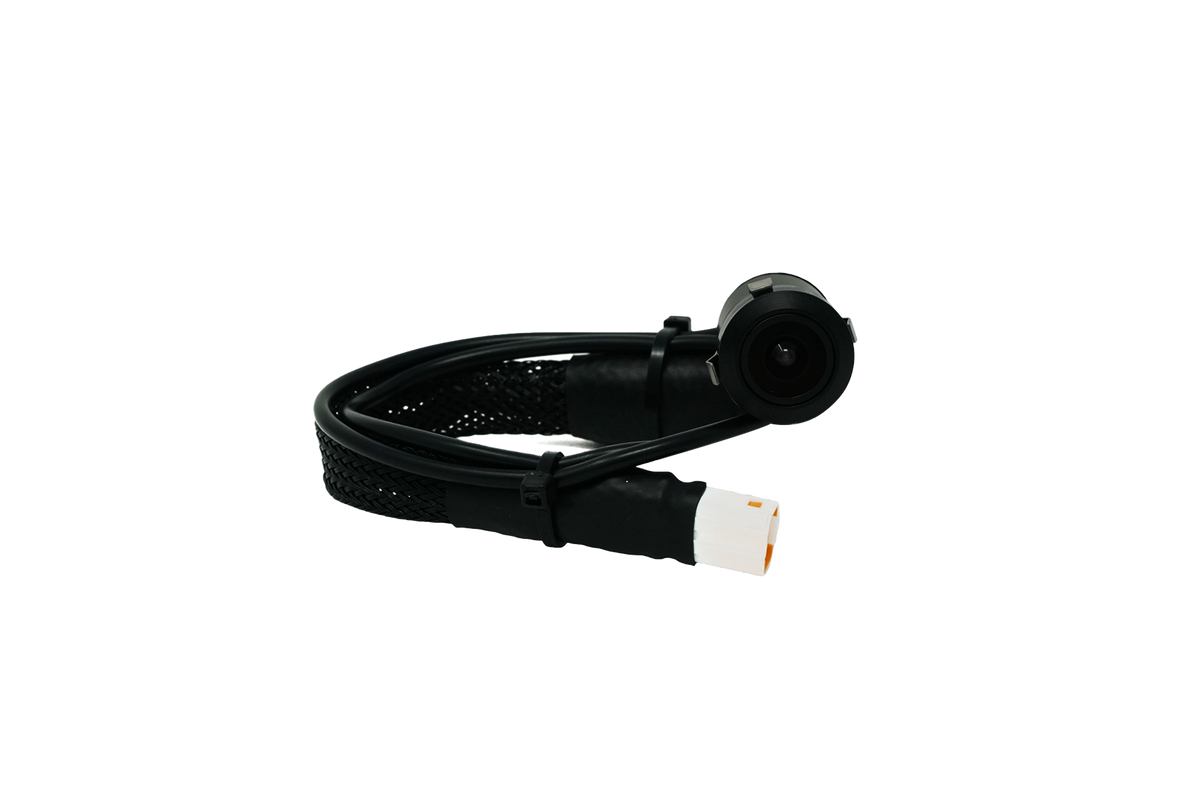 Automotive backup camera with black braided cable and white electrical connector