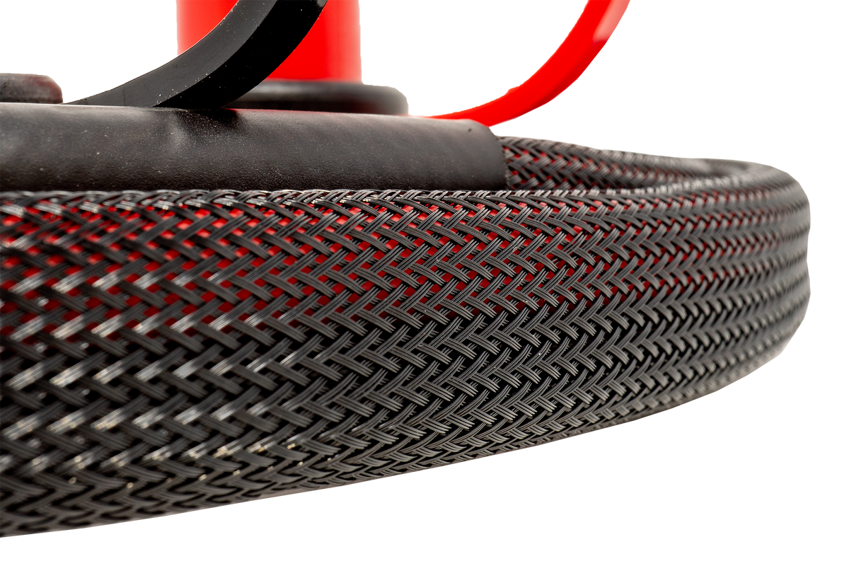 Close up of a black braided protective cable sleeve