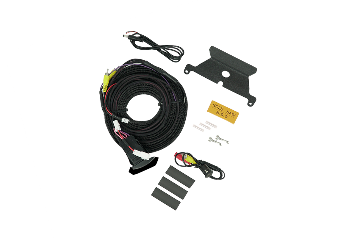 Vehicle backup camera installation kit with wiring harness, mounting bracket, hole saw, and hardware