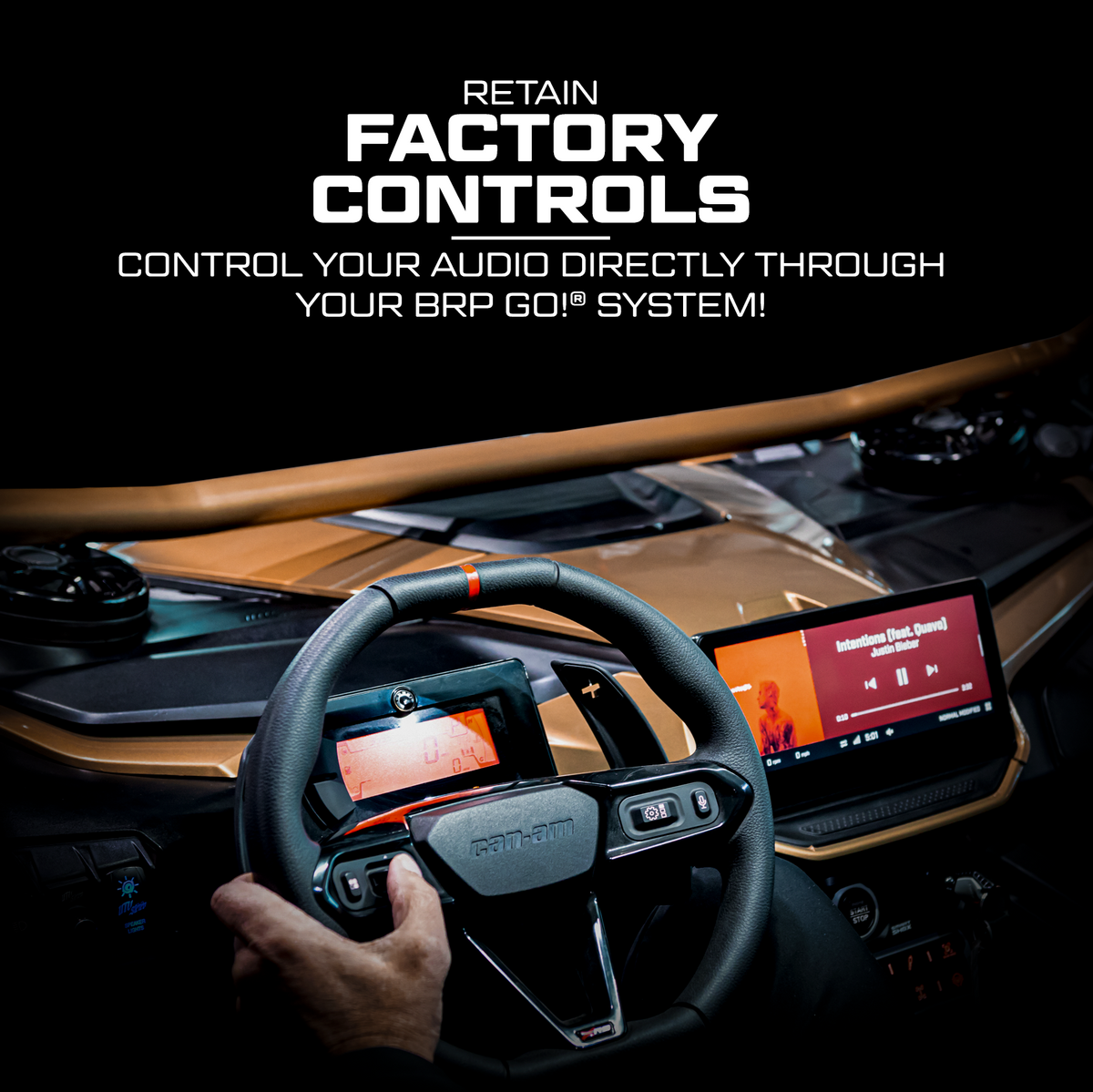 Can-Am vehicle interior showing steering wheel and BRP GO system display for audio control