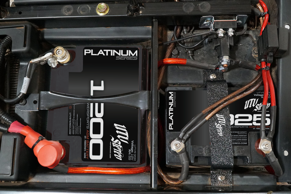 UTV Stereo Platinum Series 1200 and 925 AGM batteries installed in a vehicle battery compartment