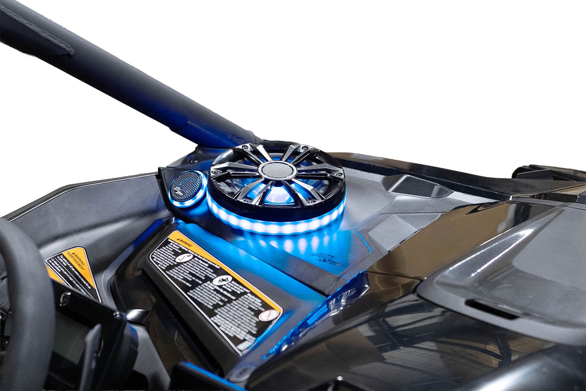 UTV Stereo speaker system with blue LED lighting installed in a vehicle dashboard
