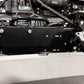 Black metal switch panel mounted on vehicle dashboard frame