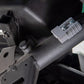 Grey electrical connector mounted on a black metal frame