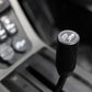 UTV Stereo branded black gear shift knob in vehicle interior
