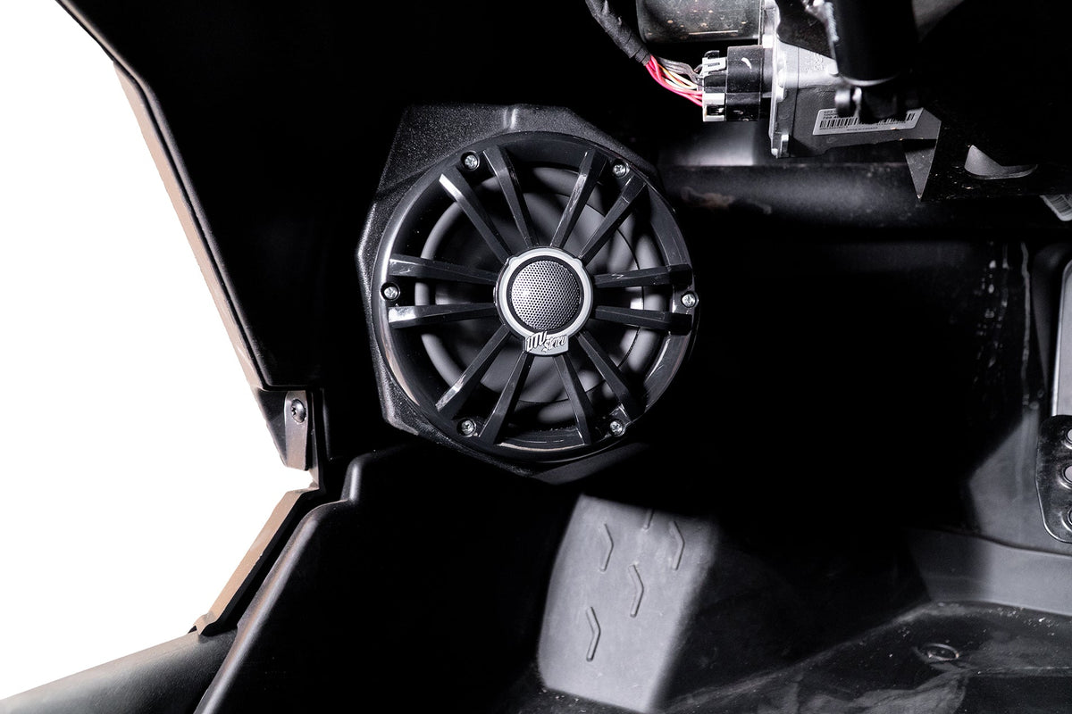 UTV Stereo speaker mounted in a vehicle interior panel