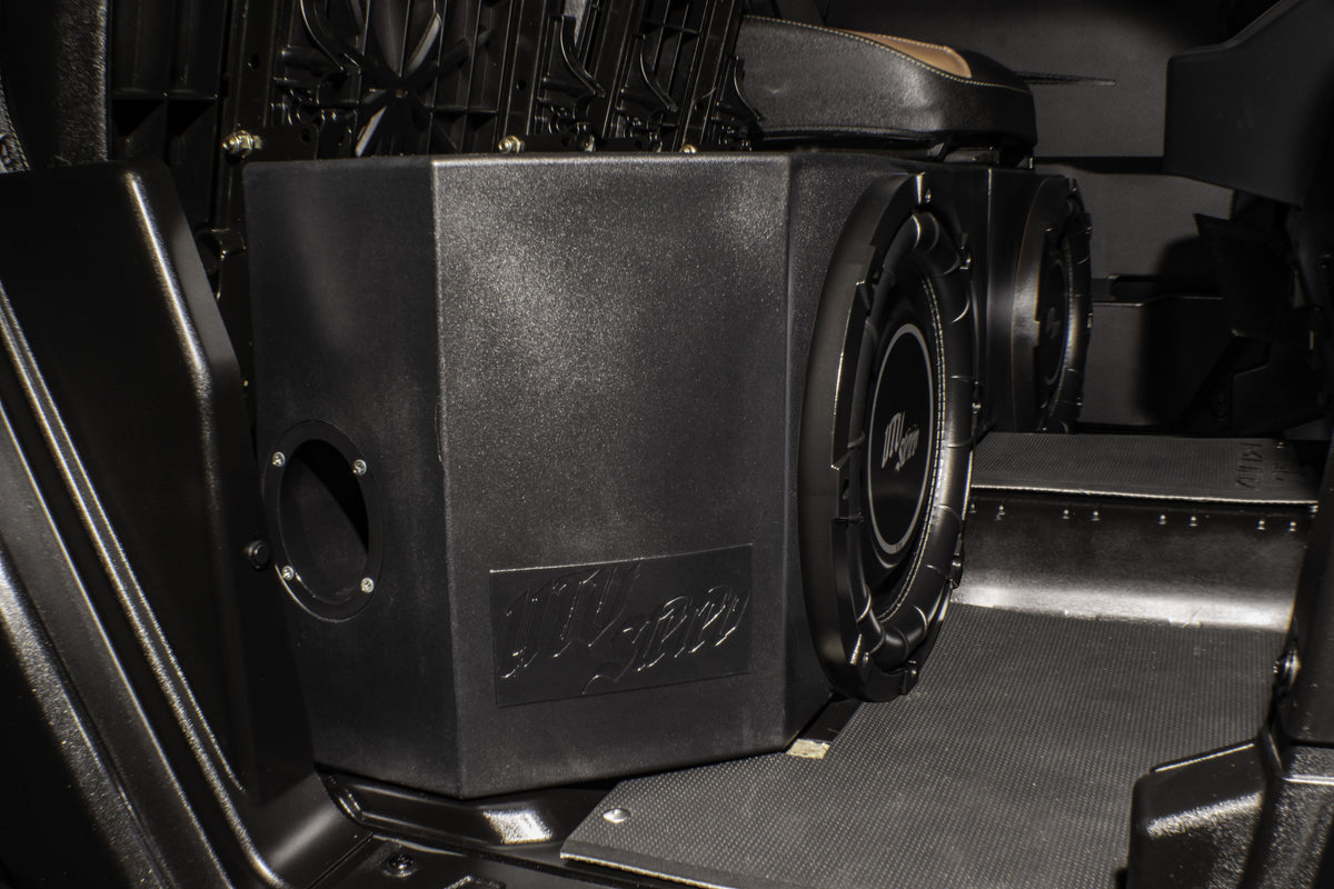 UTV Stereo dual subwoofer enclosure installed in vehicle